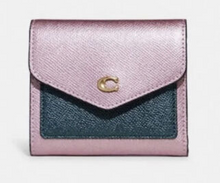 Load image into Gallery viewer, Coach bifold wallet (metallic pink)
